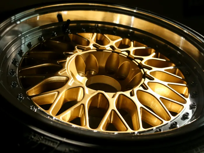 Example after photo: a different mesh wheel in a fresh gold finish with a polished lip